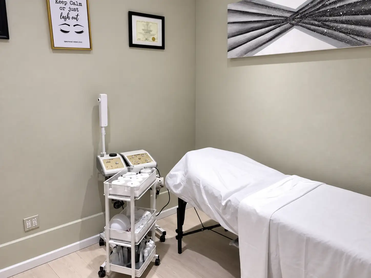Lash and skincare room at Allure with treatment equipment and a bed