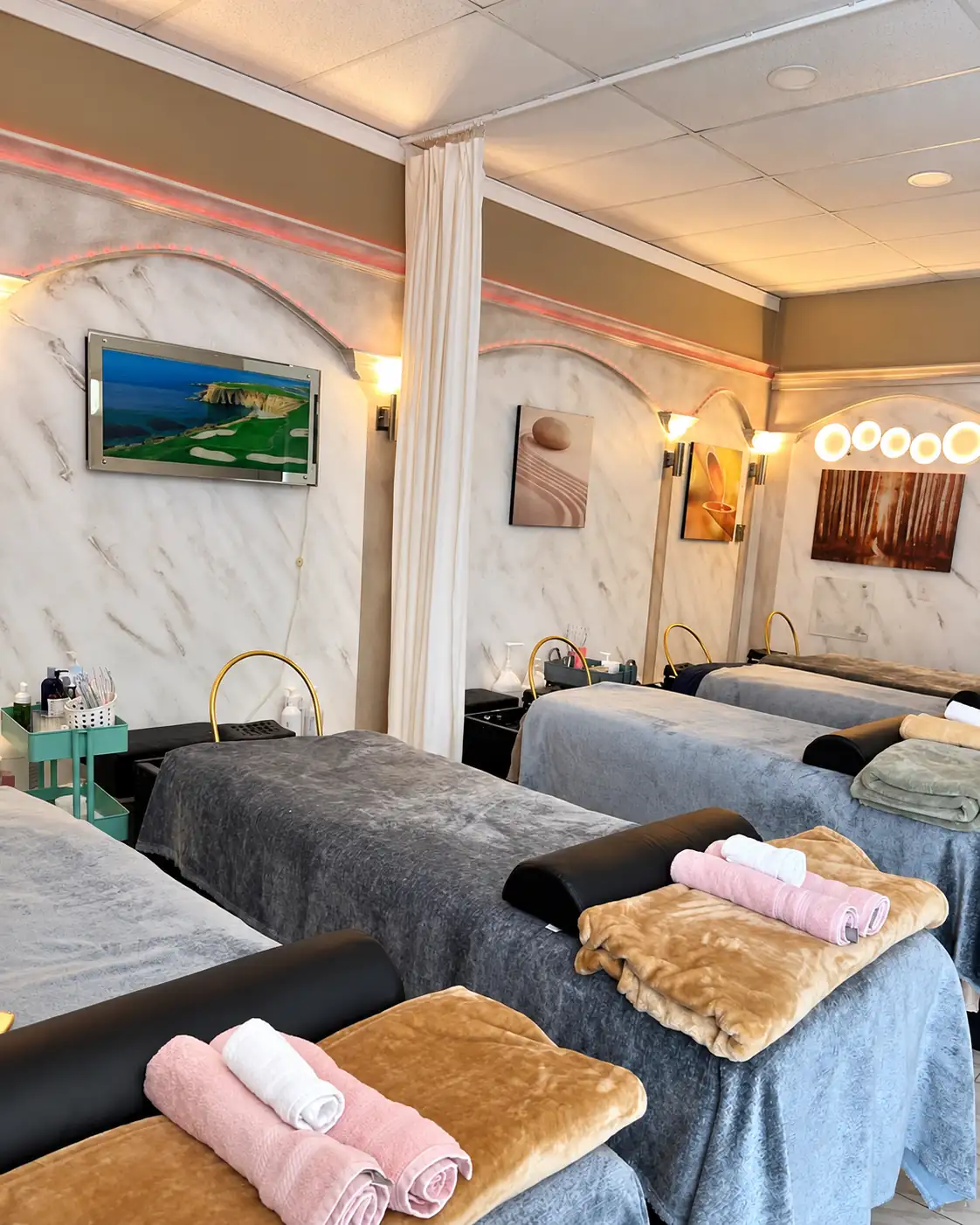 Head spa suite at Allure with reclining beds and soft lighting