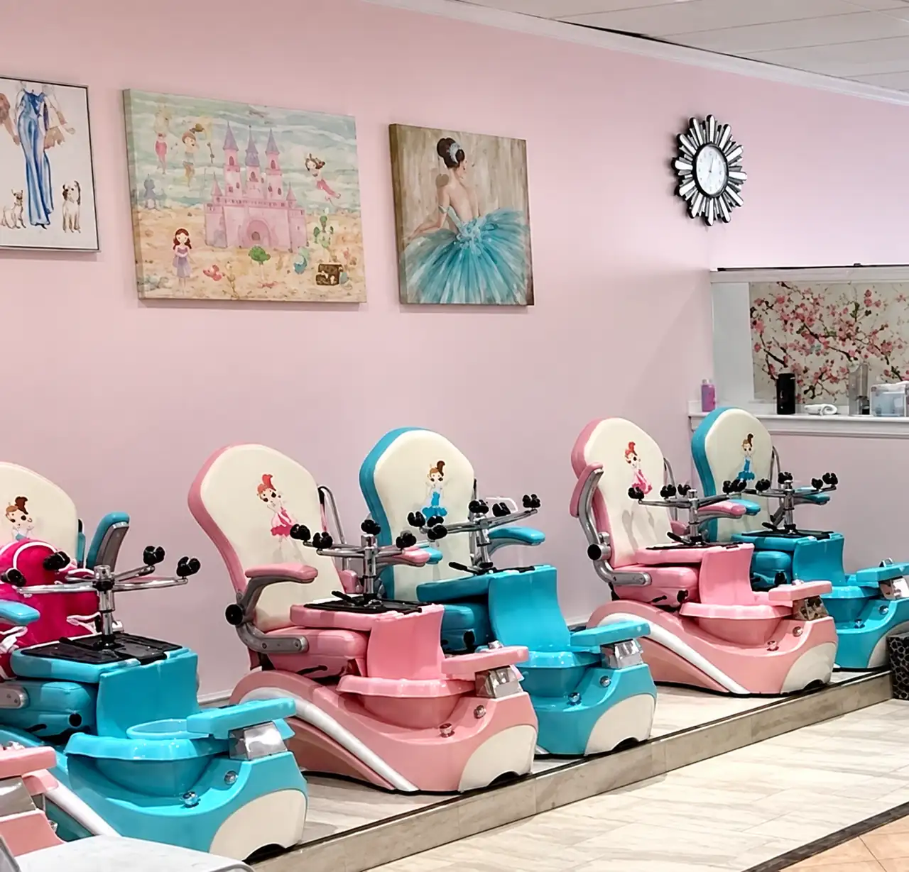 Children's pedicure chairs in the kids area at Allure